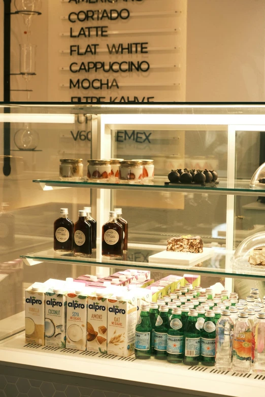 various condiments and beverages displayed on a counter