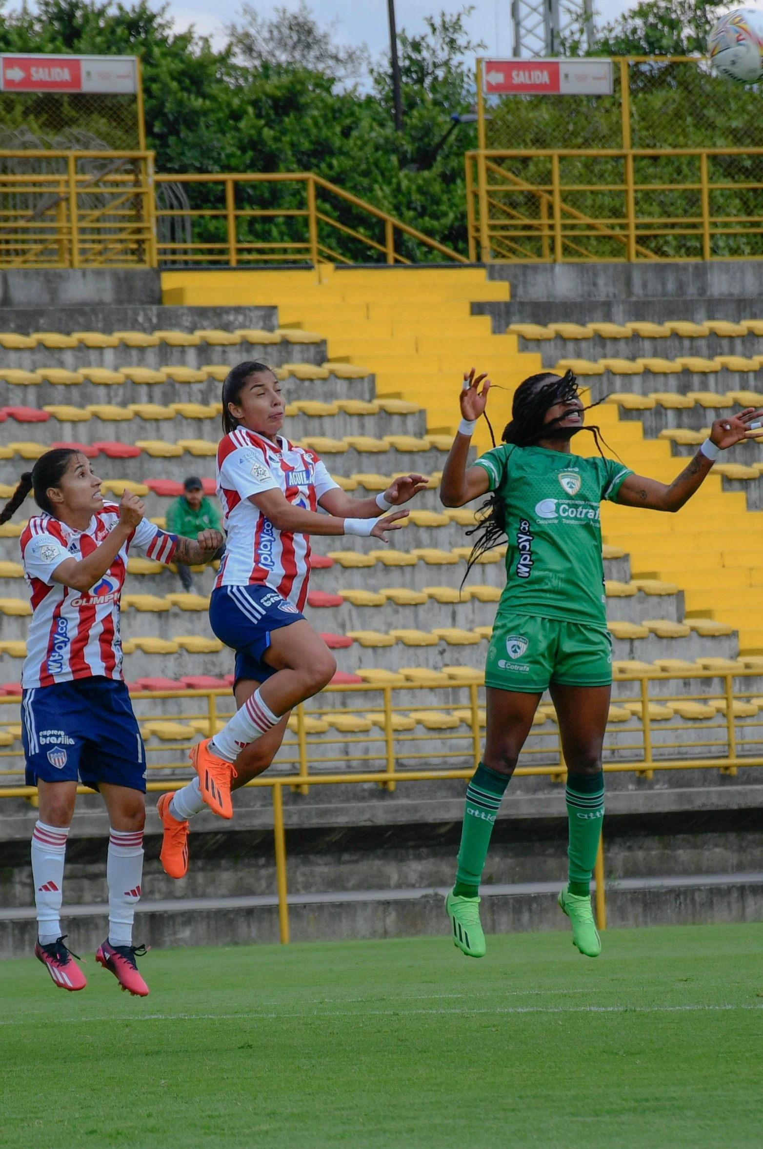 some female soccer players are going to try and block