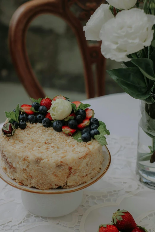 a cake on top of a plate with berries