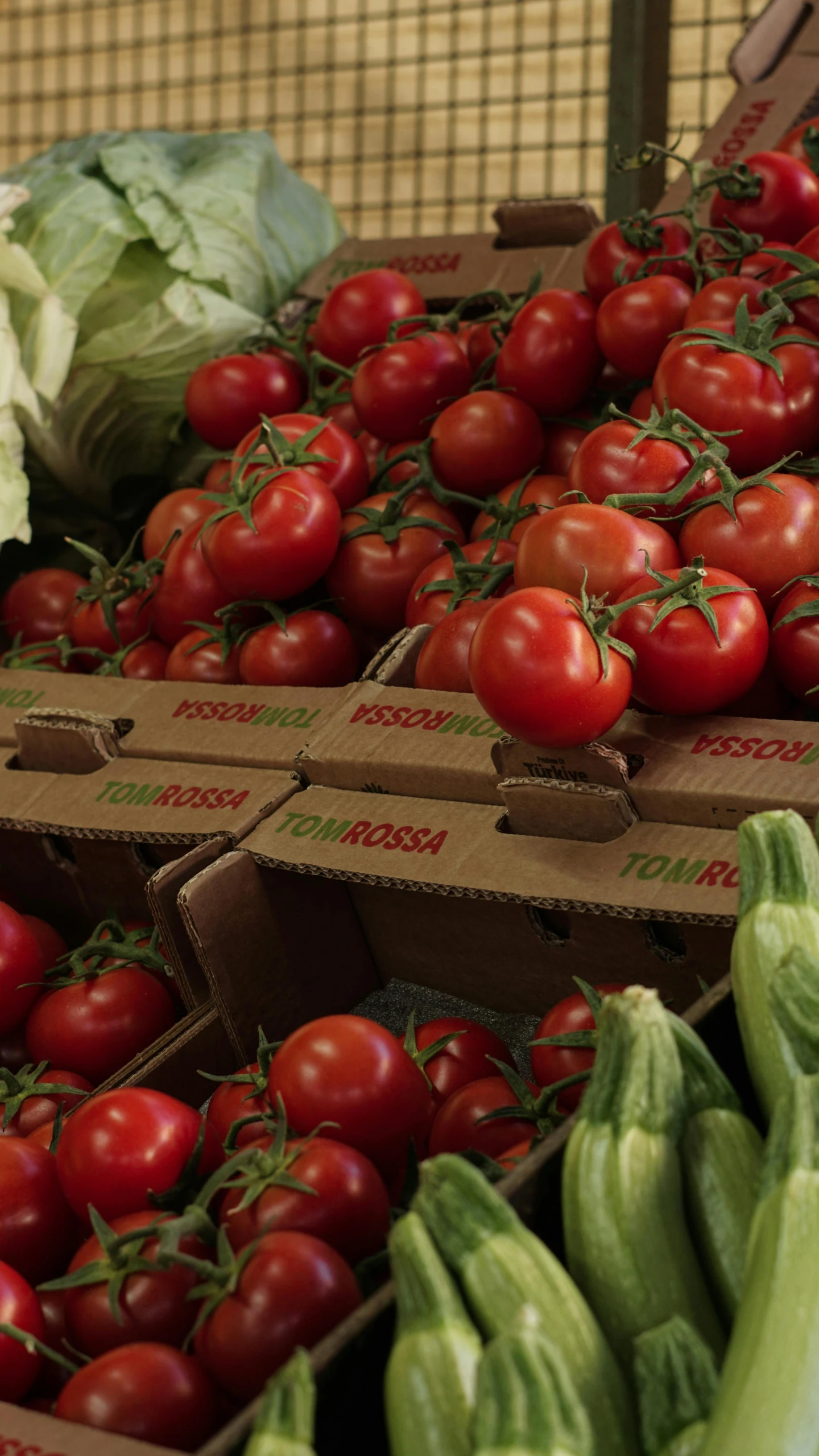 boxes filled with lots of different types of vegetables