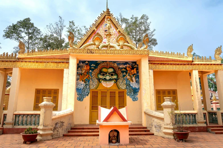 there is an outside view of this temple with a statue in it