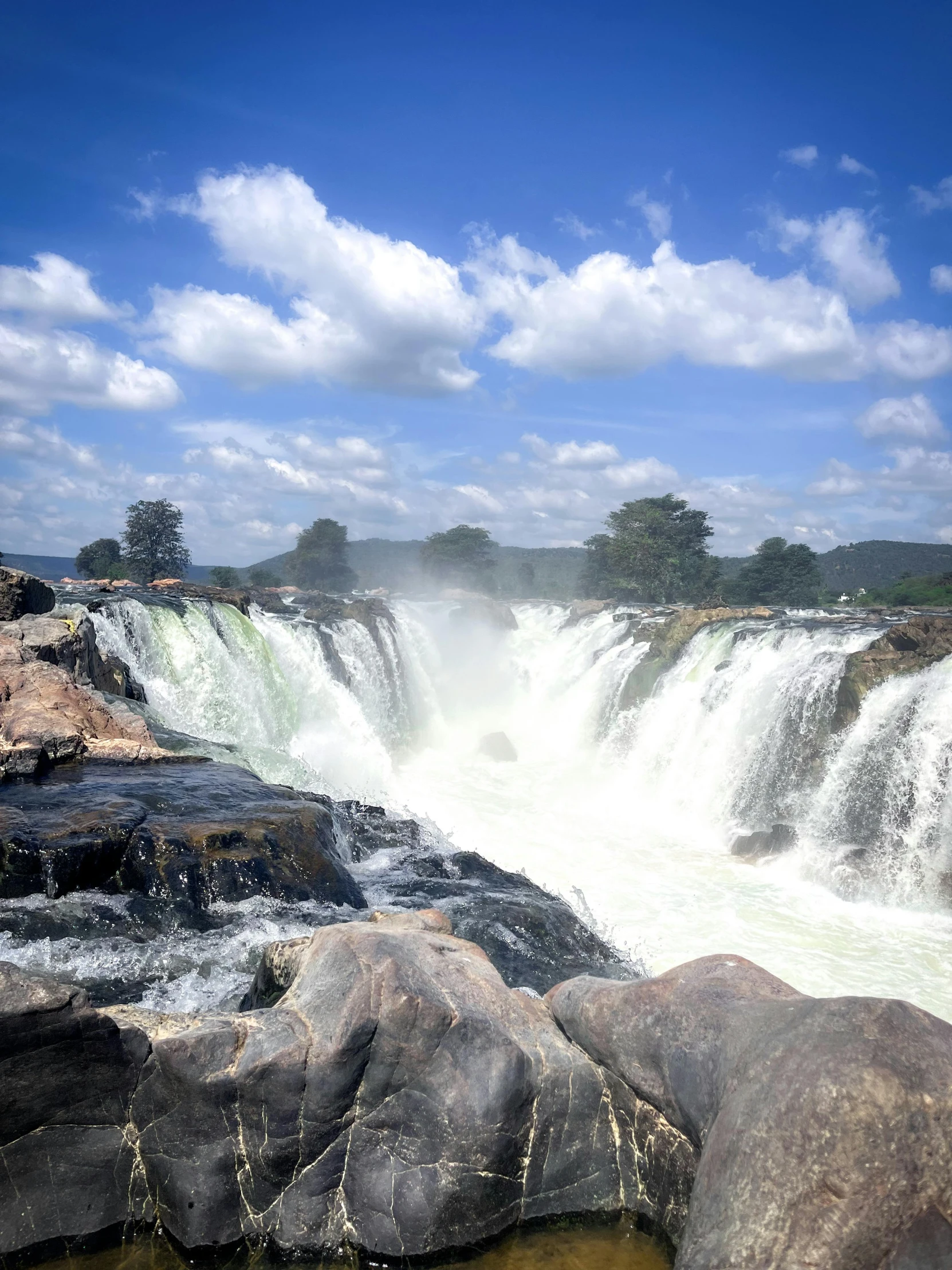 an image of a view of a waterfall that is high