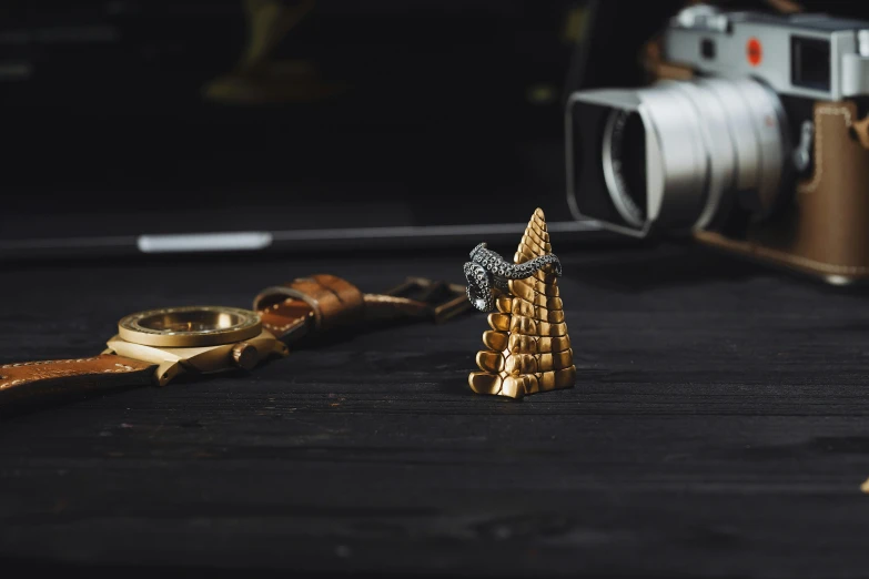 a small toy sitting on top of a wooden table