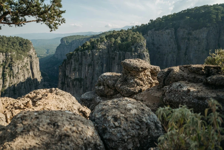 the mountains are surrounded by a cluster of rocky formations