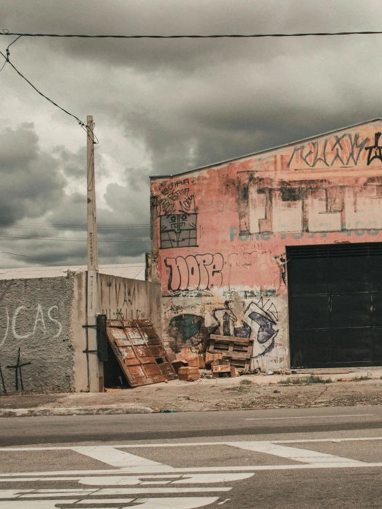 the side of a building with some graffiti on it