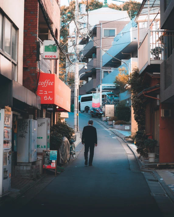 a man that is walking down the street