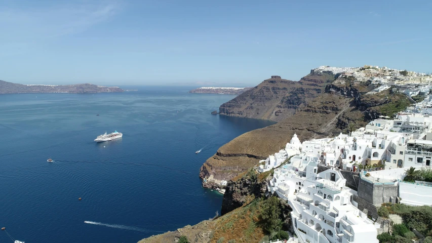 a view of the water from the top of a cliff