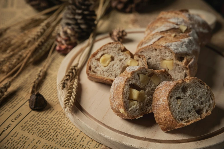 two plates of nutella bread with some pine cones