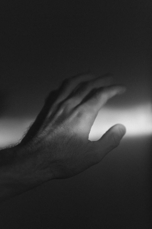 an abstract image of someones hand on a mouse