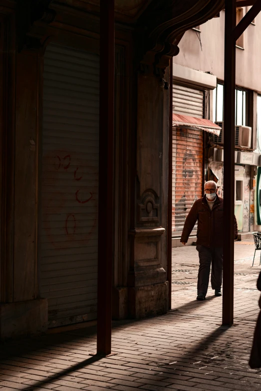 the couple is walking down the street in their town