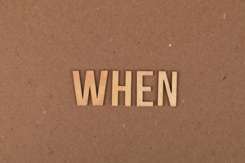 the words when spelled with wood letters on a brown background