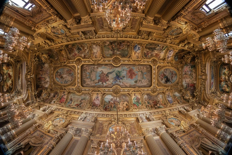 ornately decorated ceiling and windows in an old european building