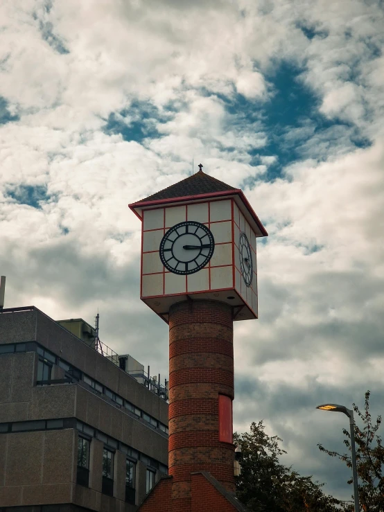 a large clock tower in front of a building