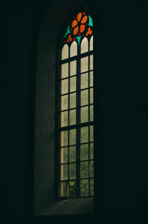 the large window is shown with stained glass