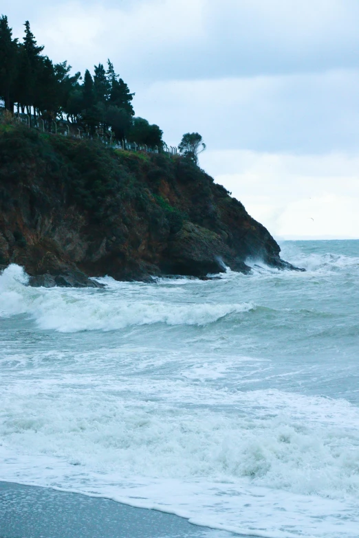 waves wash on the beach and the ocean