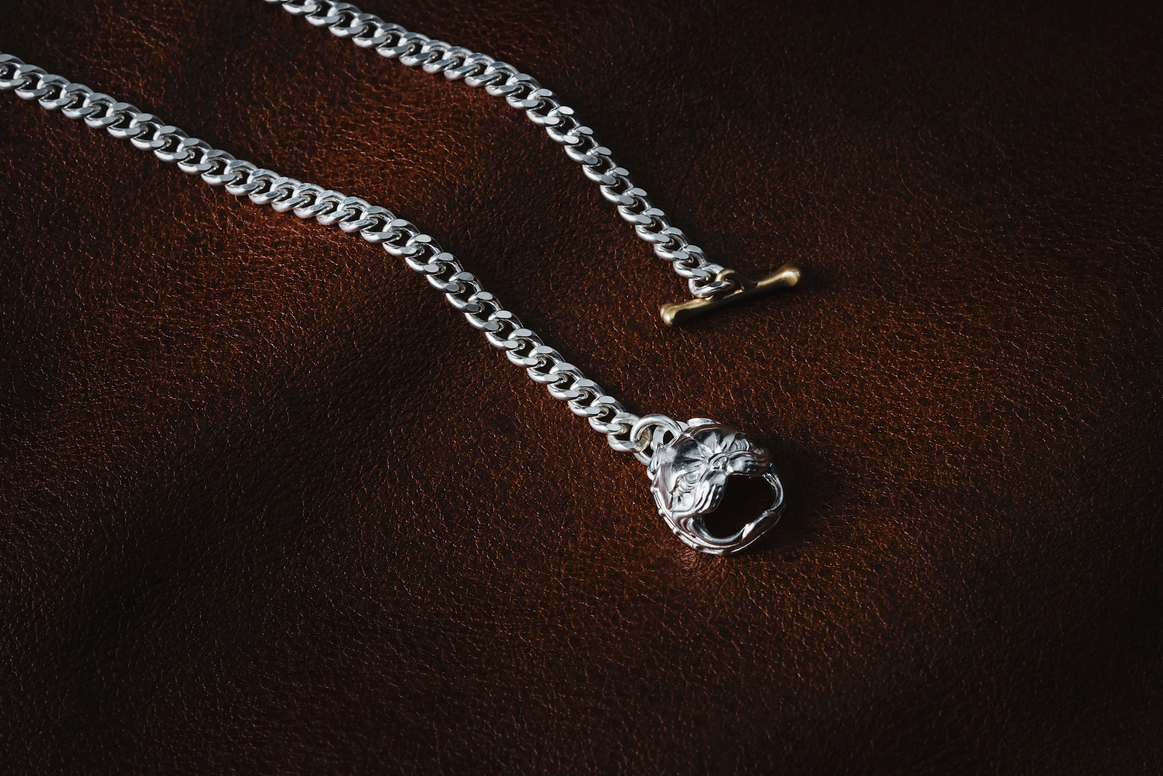 an image of a ring  on a brown background