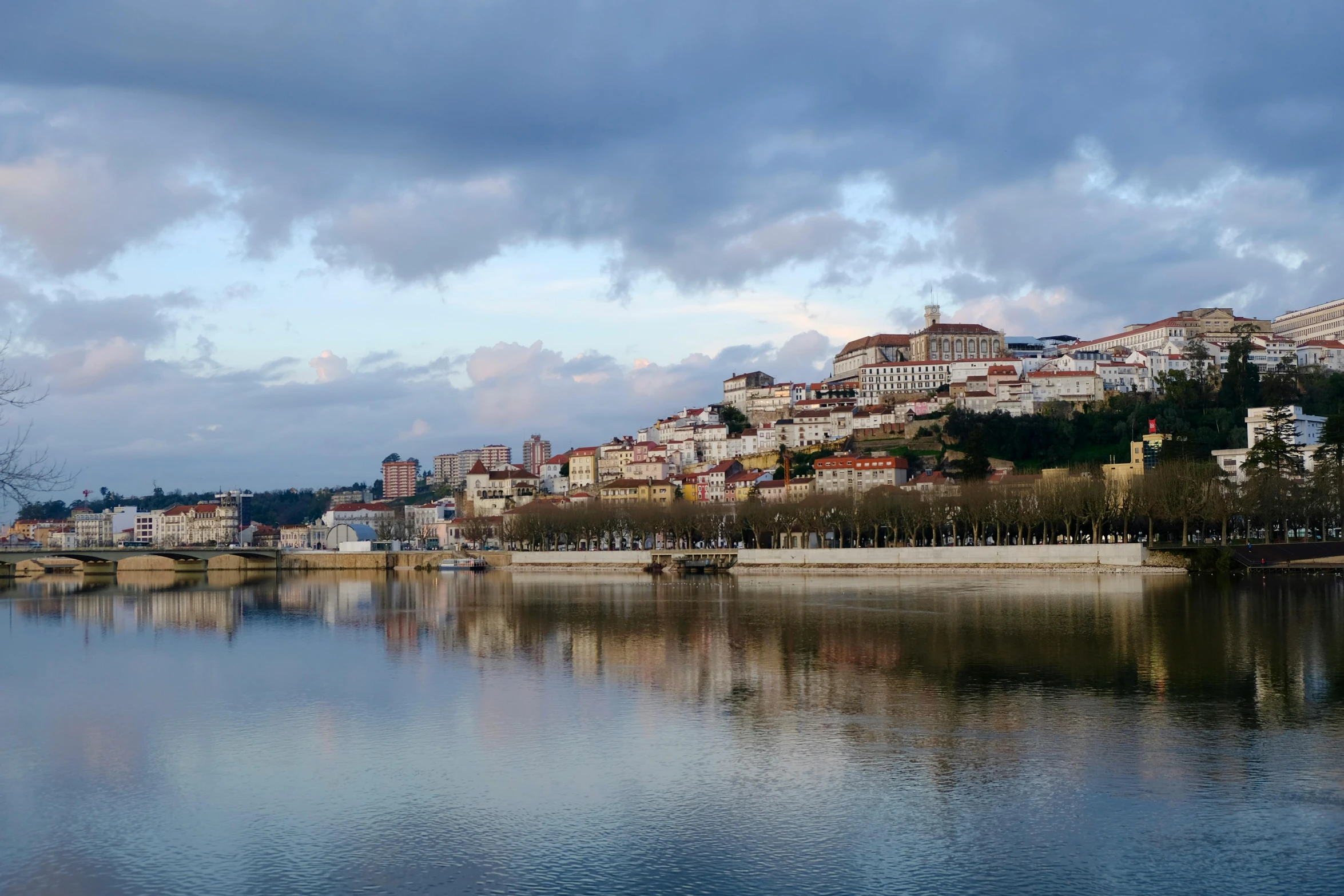 a city with a river and many buildings