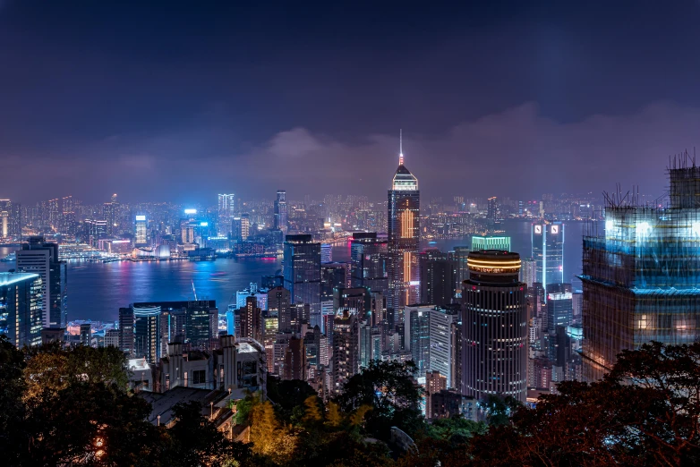 the view from the observation deck of a high rise building at night