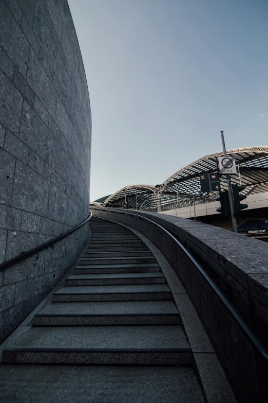 there is a very tall building and stairs