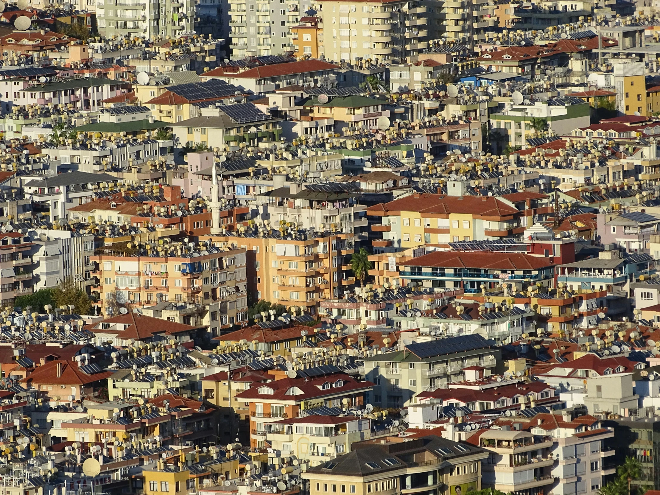 a city view with the top half of the houses and the roofs of the buildings