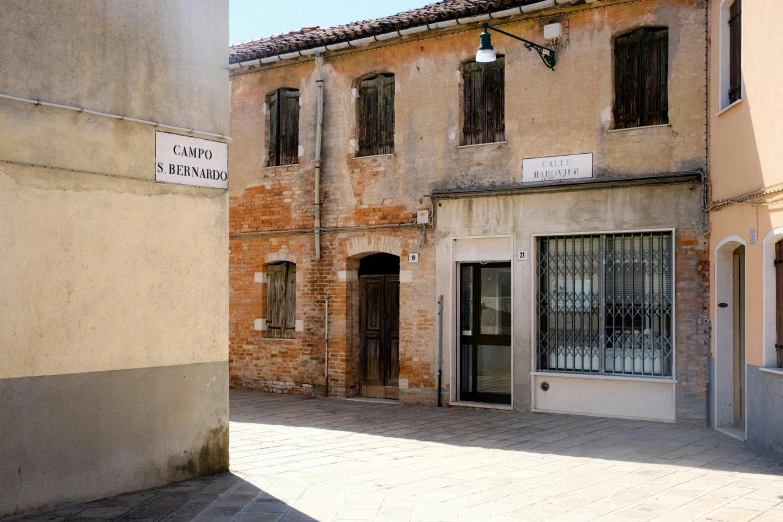 the corner of an empty alley with the doors open