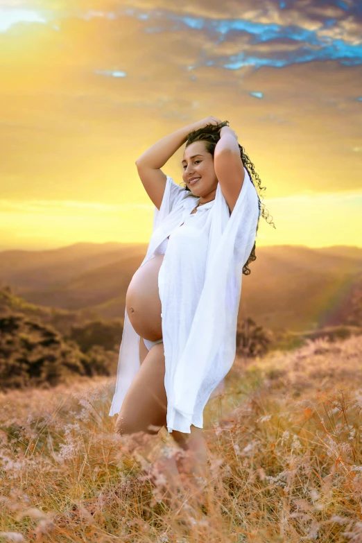 this is a beautiful young woman in white posing for the camera