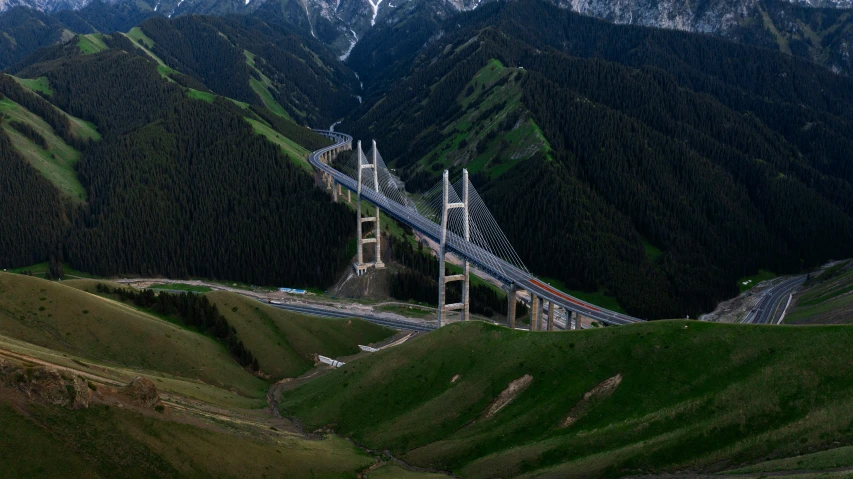 a bridge near the top of a hill