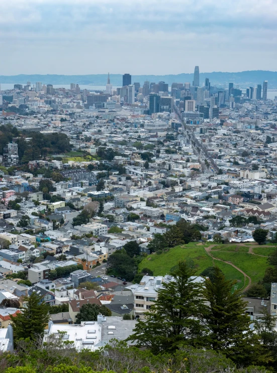 a large city skyline over a small town