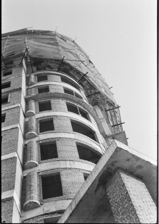 an old building has multiple balconies on it