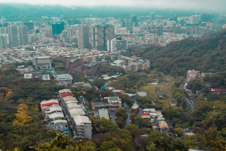 a scenic po taken from an aerial view of buildings in a forested area