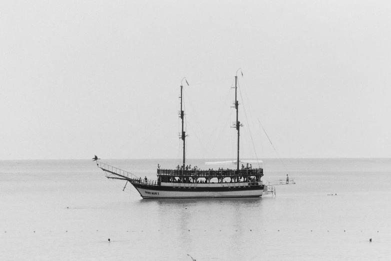 a boat floating on top of a body of water