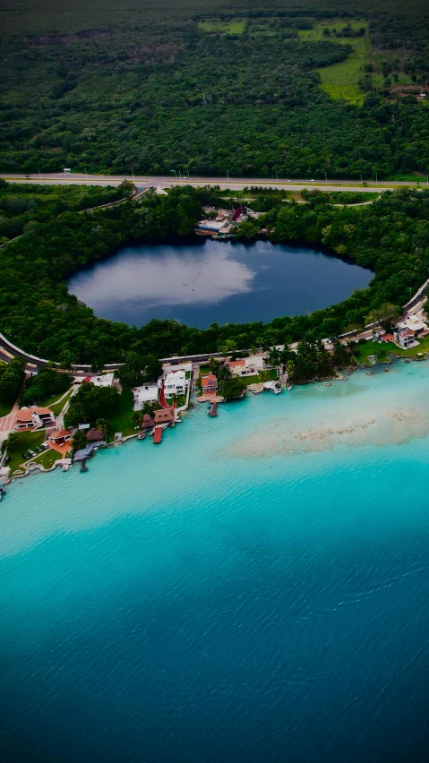 an island in the ocean is shown with a small plane landing on it