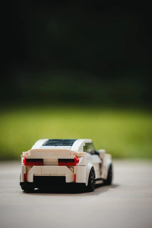 an electric toy car that is on a surface