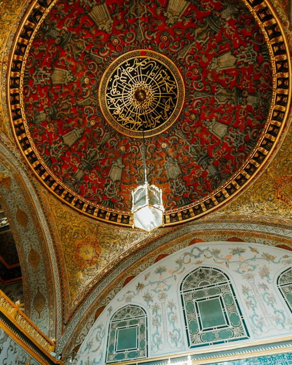 an ornate wall and ceiling in an old building