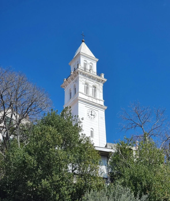 a tall tower with a clock on each of it's sides