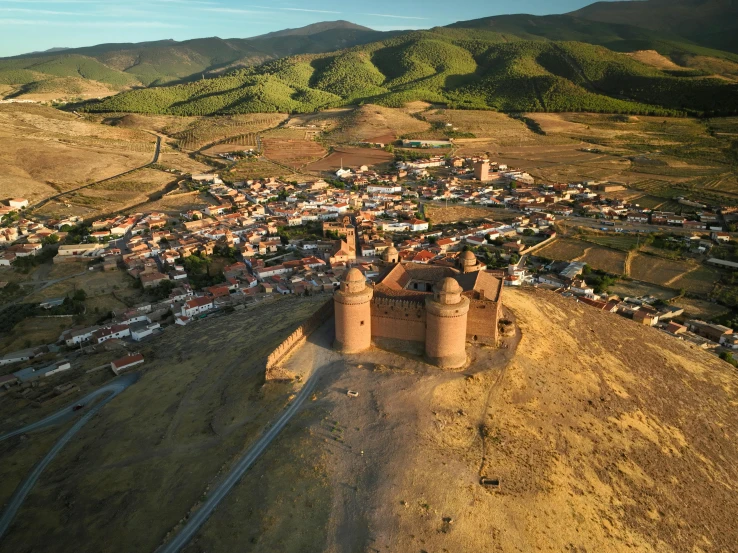 a large castle is sitting in the middle of nowhere