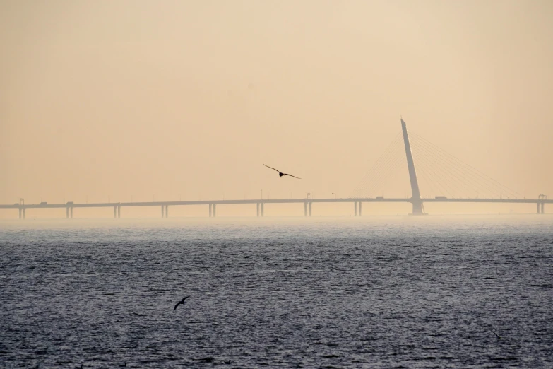 a long bridge going across a body of water