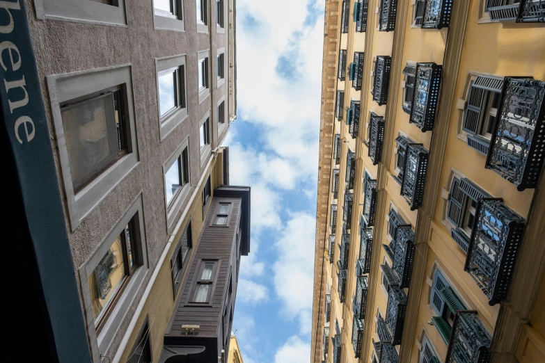 some buildings have many windows and a clock