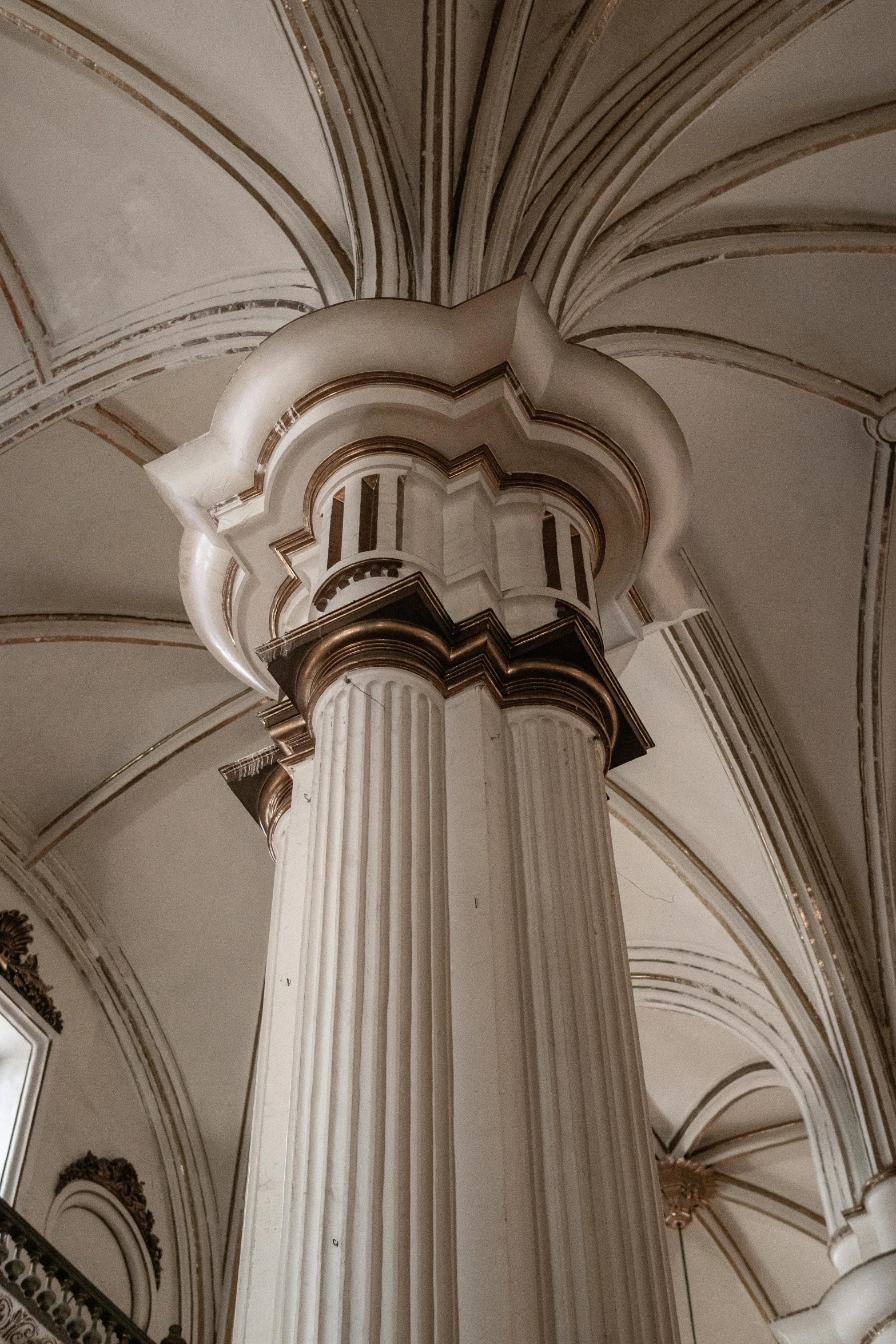 an ancient architectural structure with a dome, pillars and columns