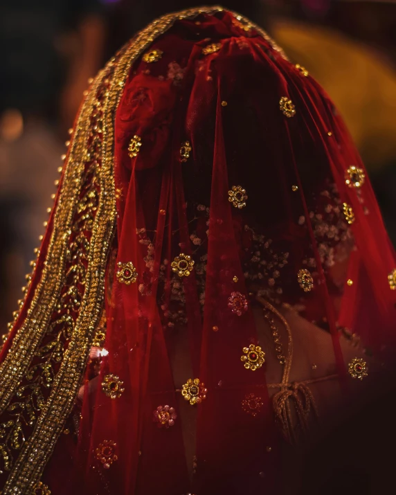 close up of wedding veil dd over woman's head