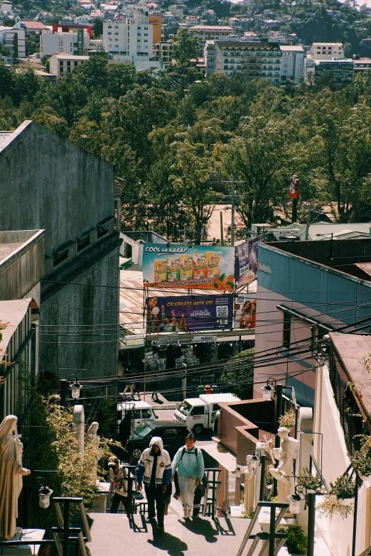 the back alley features tables, chairs and umbrellas