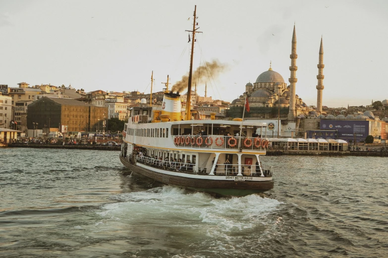 a large boat is sailing down the water