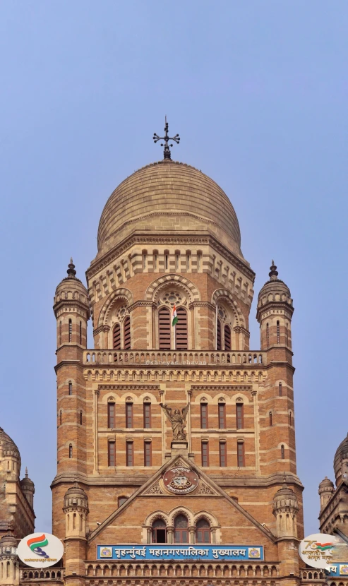 a view of a tall, domed building with a clock tower