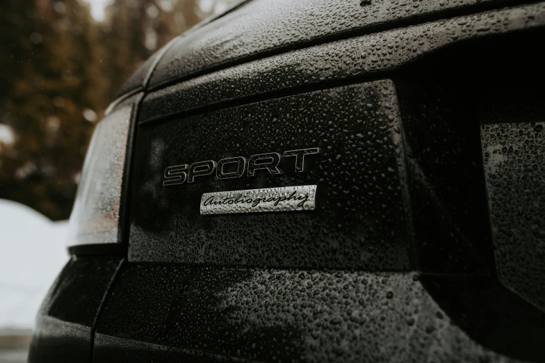 close up of emblem and logo on the back of a car