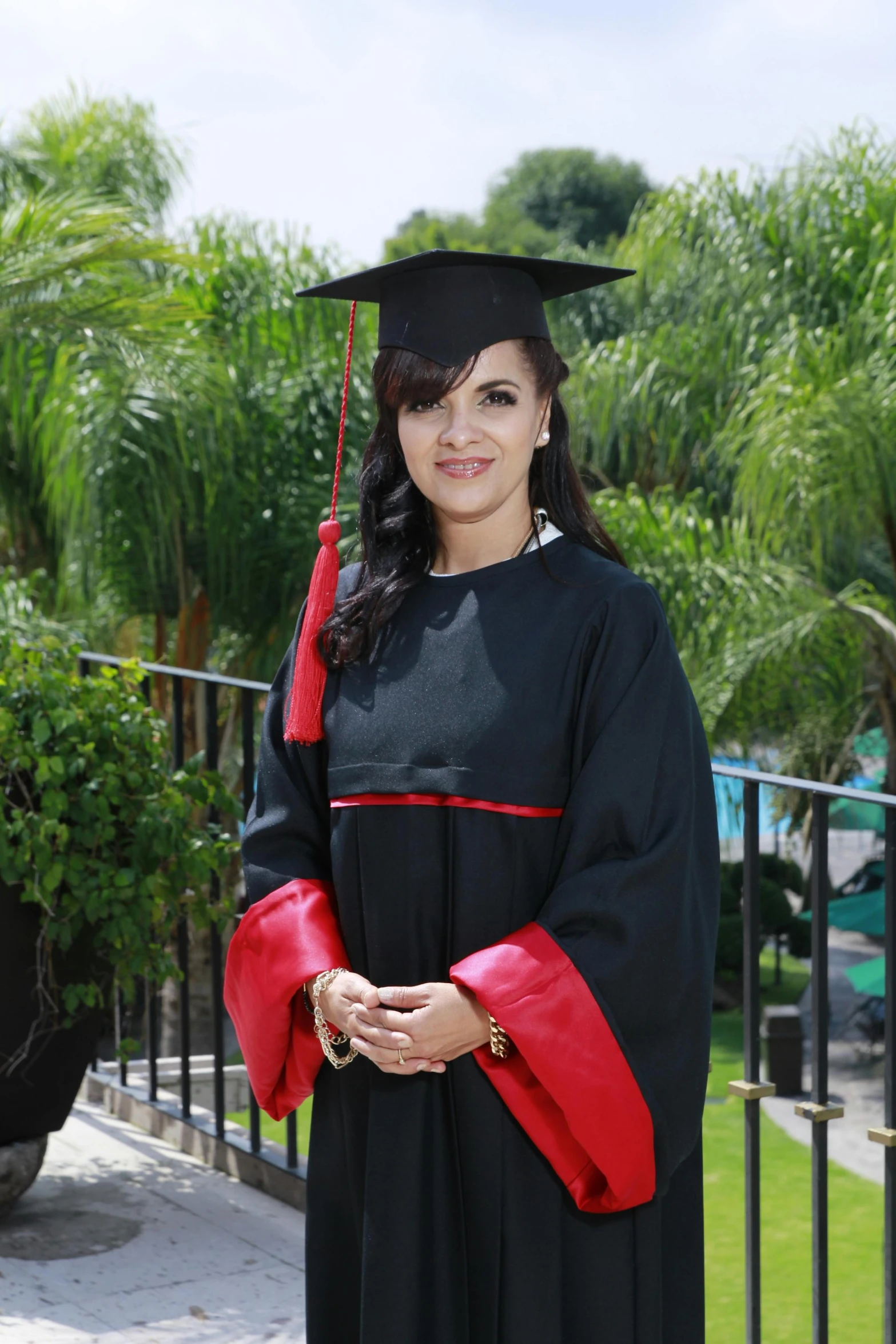 a woman wearing a graduation cap and gown