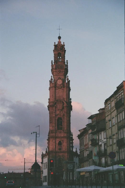 large building with a steeple and tall clock tower on it