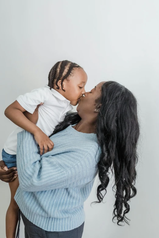 an african american woman with black children