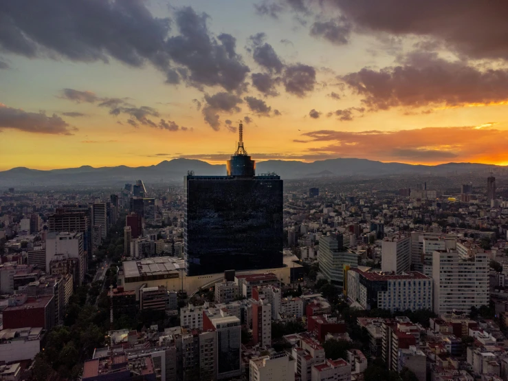 the view from a high rise at sunset of the city