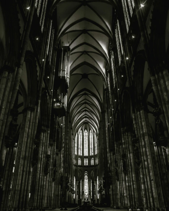 a black and white image of an empty cathedral