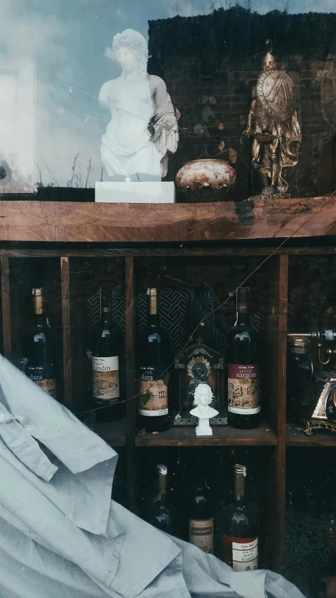 shelves are filled with bottles and figurines